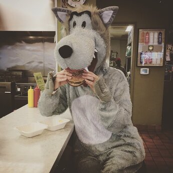 Photo of Wolfie eating.